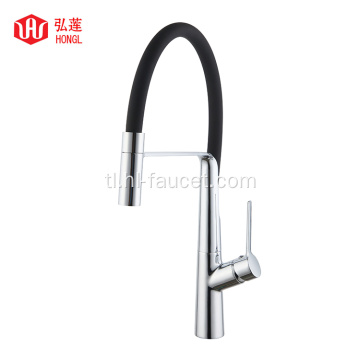 Black hose faucet countertop pull out mixer.